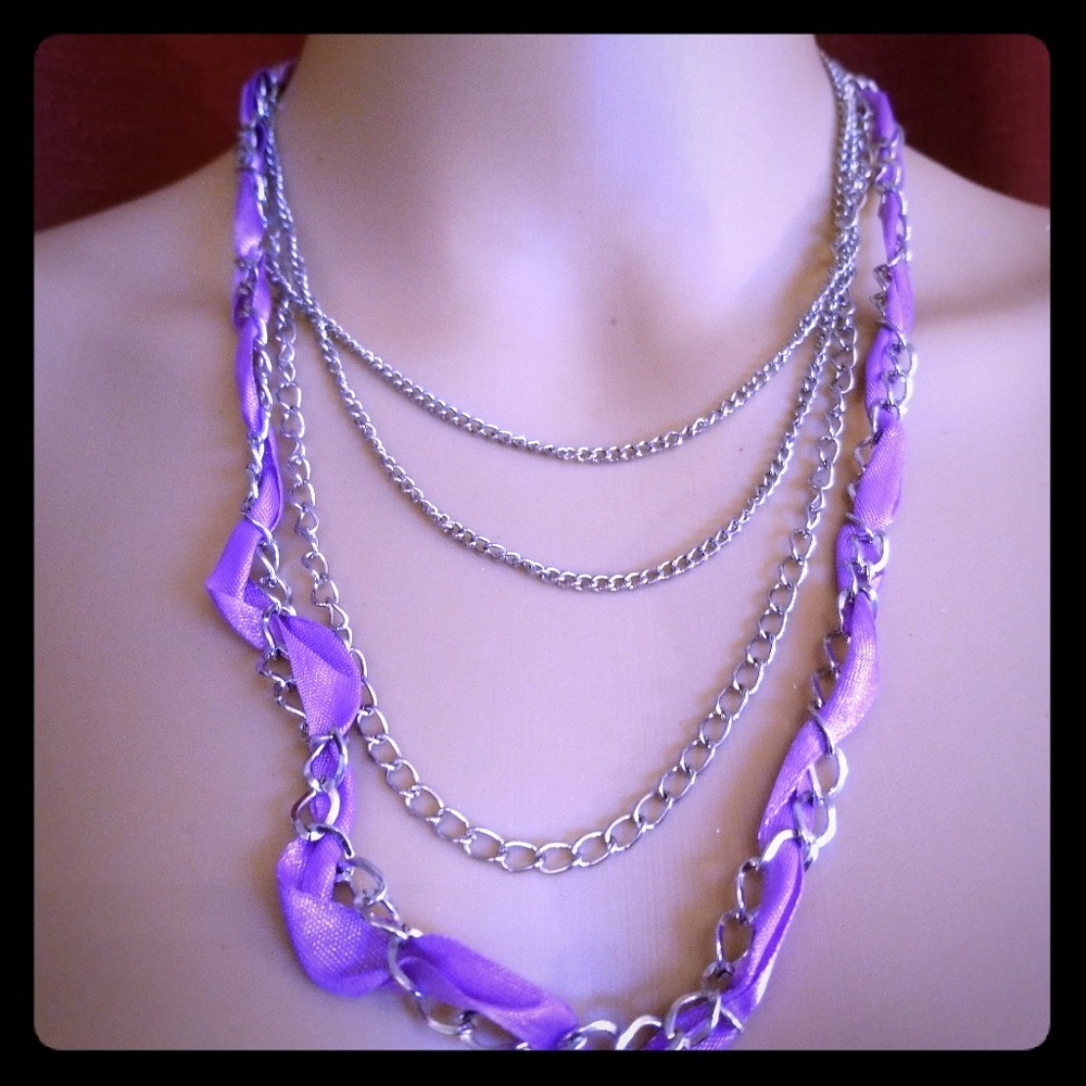 Multi chain and ribbon necklace set.